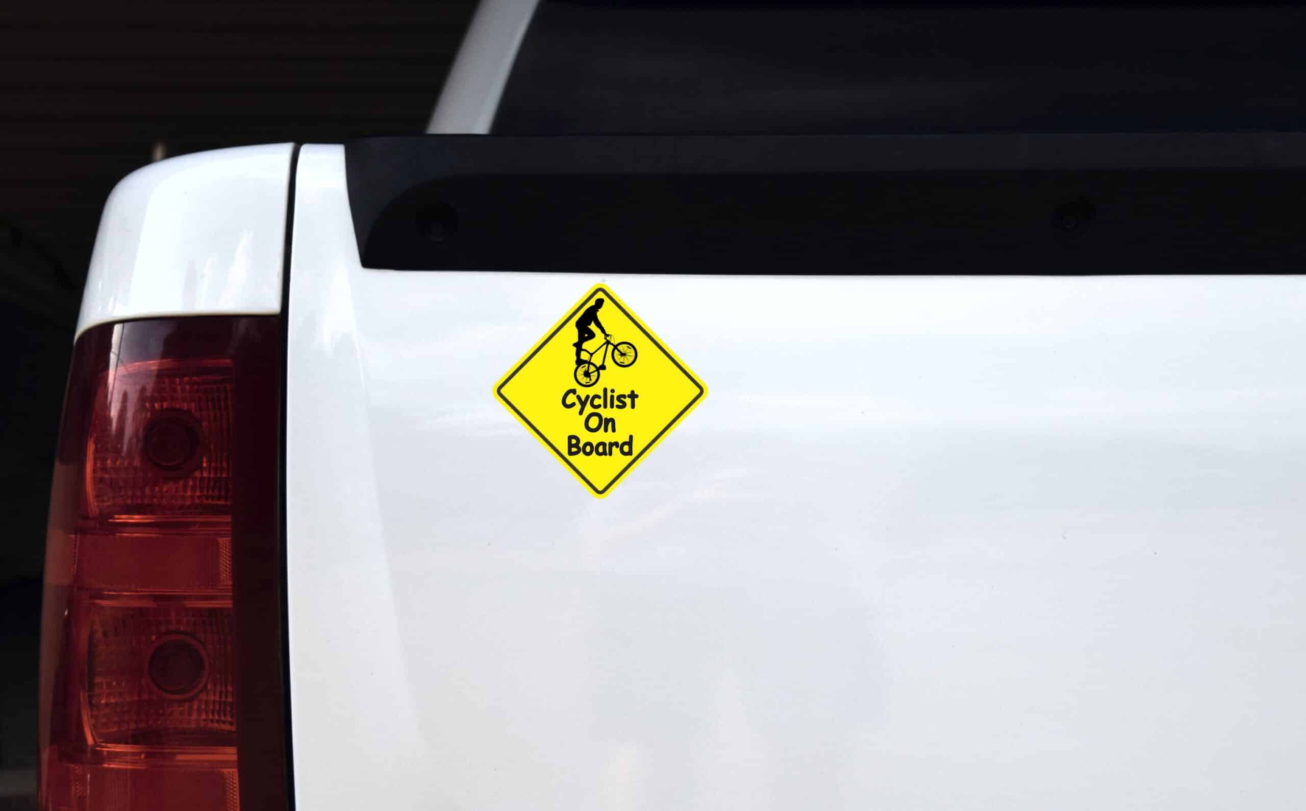 StickerTalk Male Cyclist On Board Vinyl Sticker, 5 inches by 5 inches