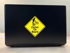 StickerTalk Male Cyclist On Board Vinyl Sticker, 5 inches by 5 inches