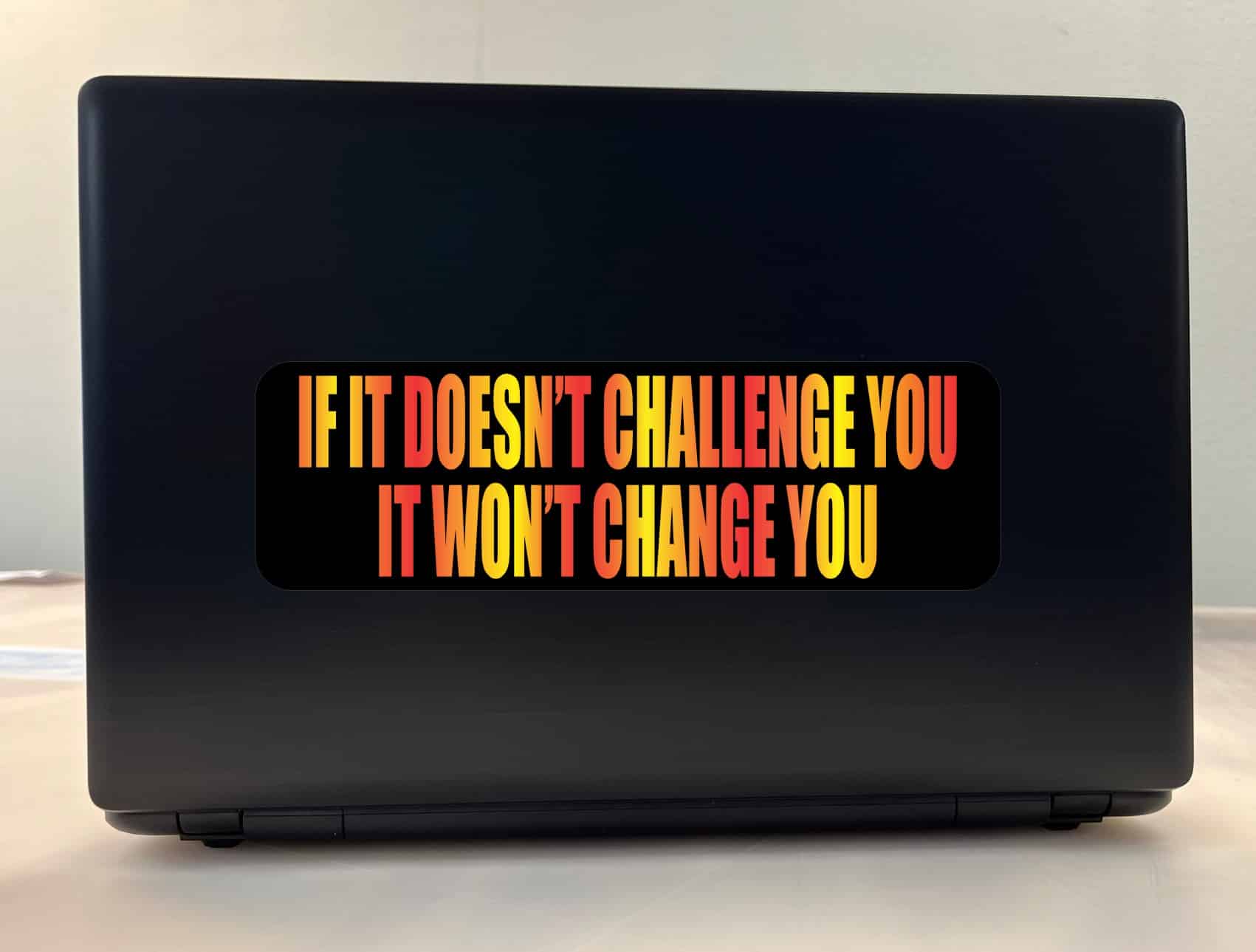 10in x 3in If It Doesnt Challenge You Bumper Sticker