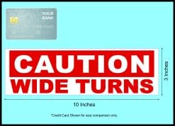 Wide turn sticker next to credit card for size