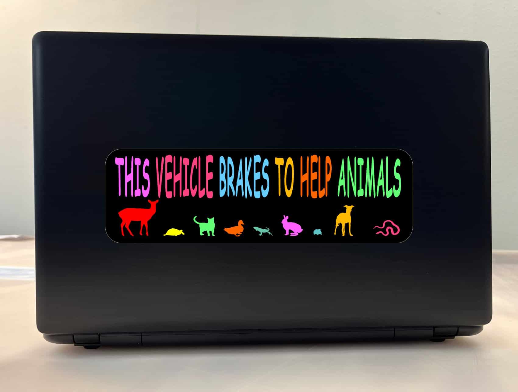 10in x 3in This Vehicle Brakes to Help Animals Bumper Sticker