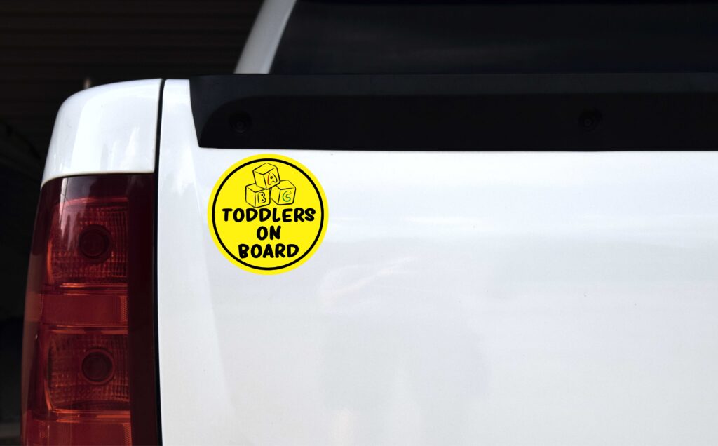 Vehicle with toddler sticker