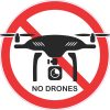 red prohibition circle, diagonal restriction line, black drone silhouette - vinyl removable sticker