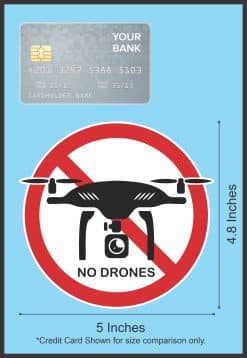 red prohibition circle, diagonal restriction line, black drone silhouette - vinyl removable sticker