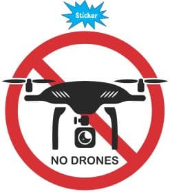 red prohibition circle, diagonal restriction line, black drone silhouette - vinyl removable sticker