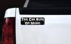 musical notes, text design, black background - vinyl removable magnet