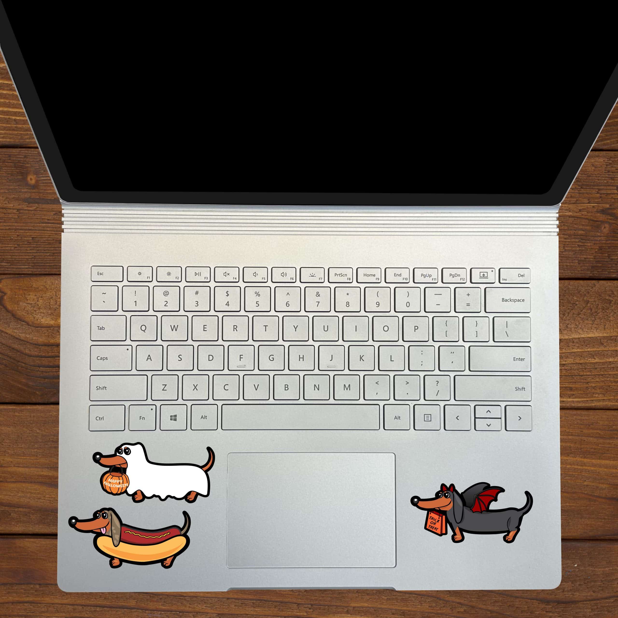 cartoon dachshunds, Halloween costumes, pumpkin basket - vinyl removable sticker
