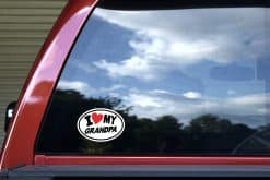 oval shape, red heart symbol, bold black typography - vinyl removable sticker