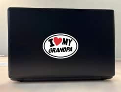 oval shape, red heart symbol, bold black typography - vinyl removable sticker