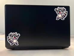 cartoon raccoon characters, excited expressions, raised arms pose - vinyl removable sticker