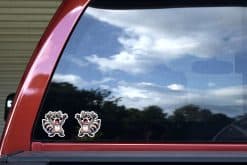 cartoon raccoon characters, excited expressions, raised arms pose - vinyl removable sticker