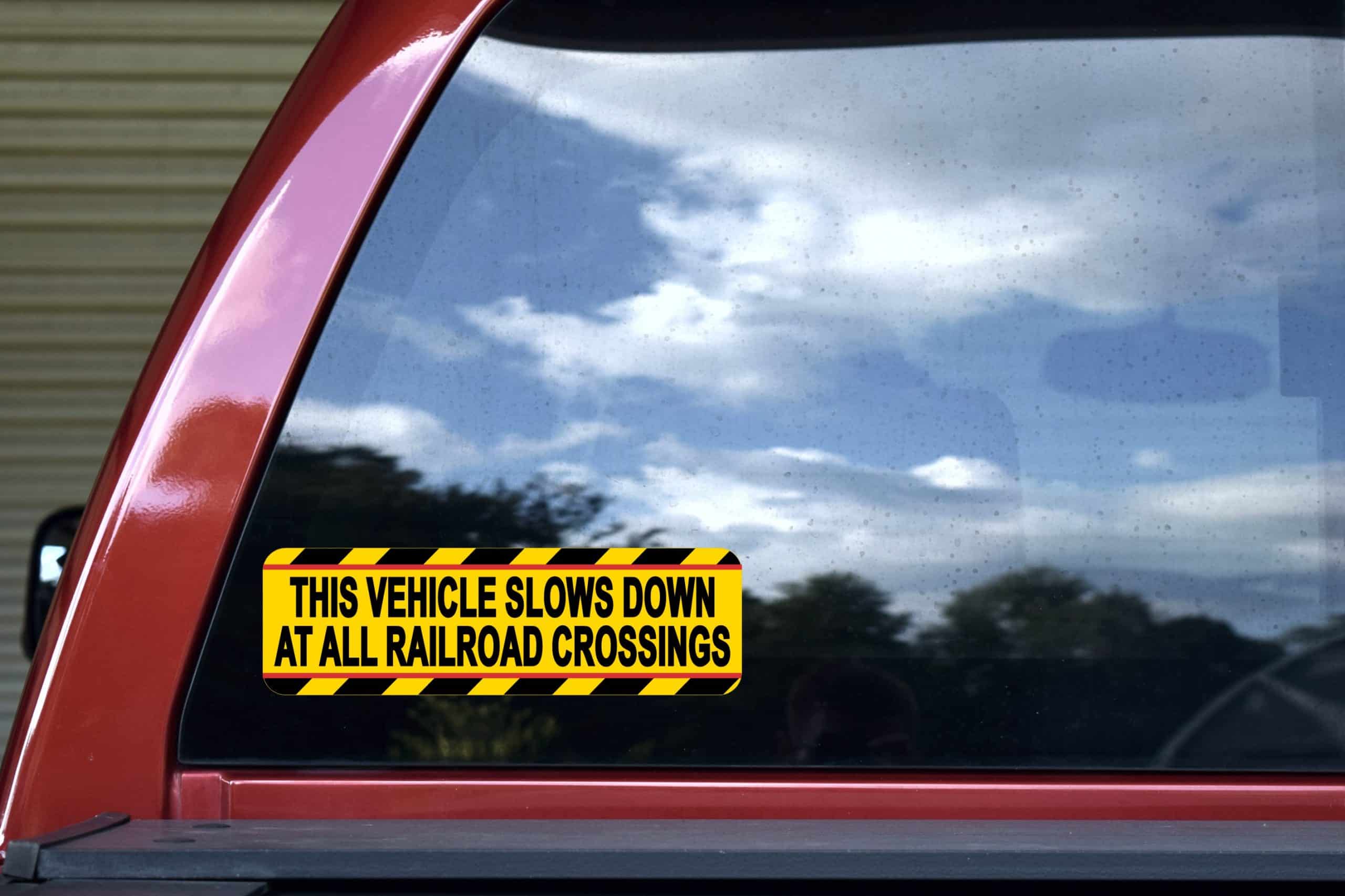 bold black text, bright yellow background, diagonal striped borders - vinyl removable sticker