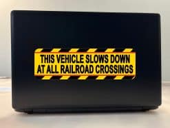 bold black text, bright yellow background, diagonal striped borders - vinyl removable sticker