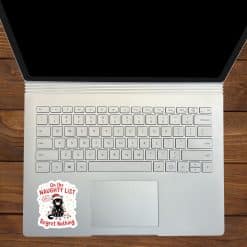 black cat with yellow eyes, santa hat, christmas lights - vinyl removable sticker