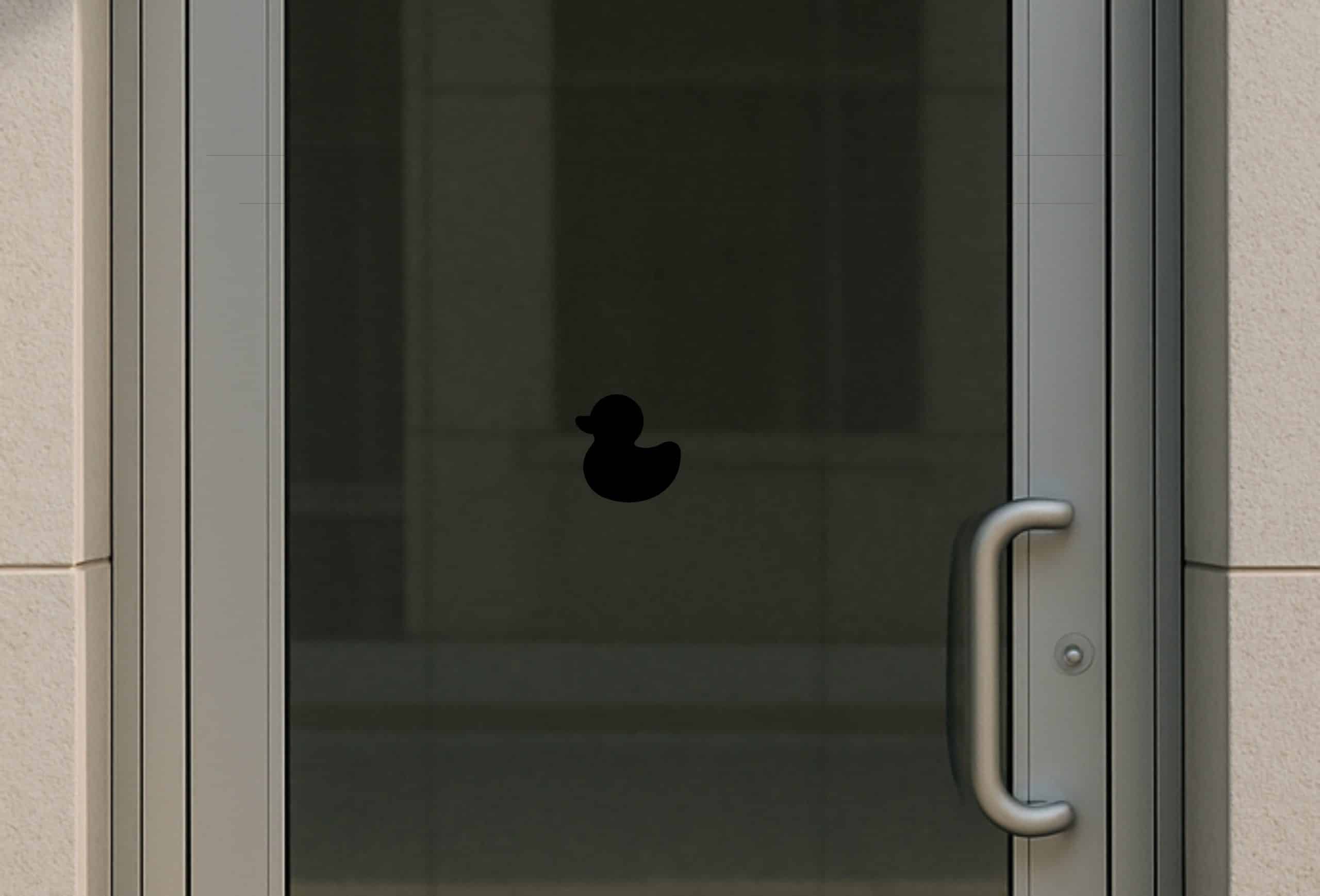 solid black silhouette, duck profile, clean minimalist design - vinyl removable sticker