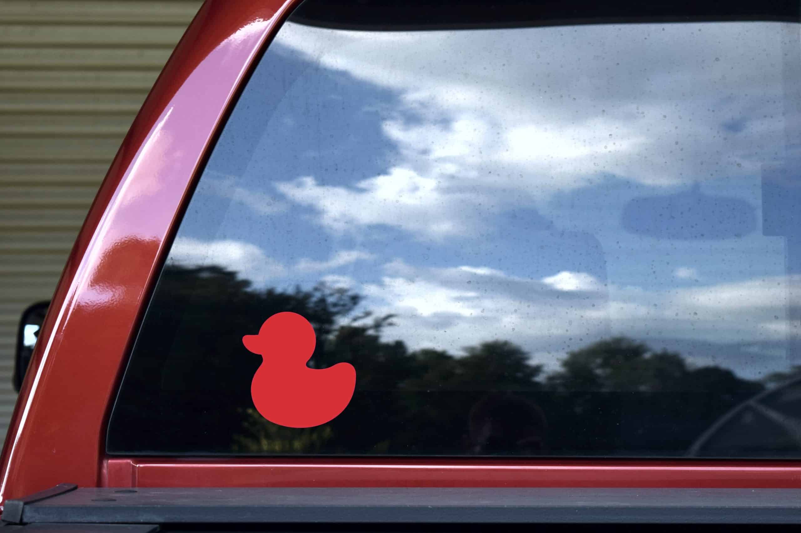 rubber duck silhouette, solid red color, classic toy shape - vinyl removable sticker
