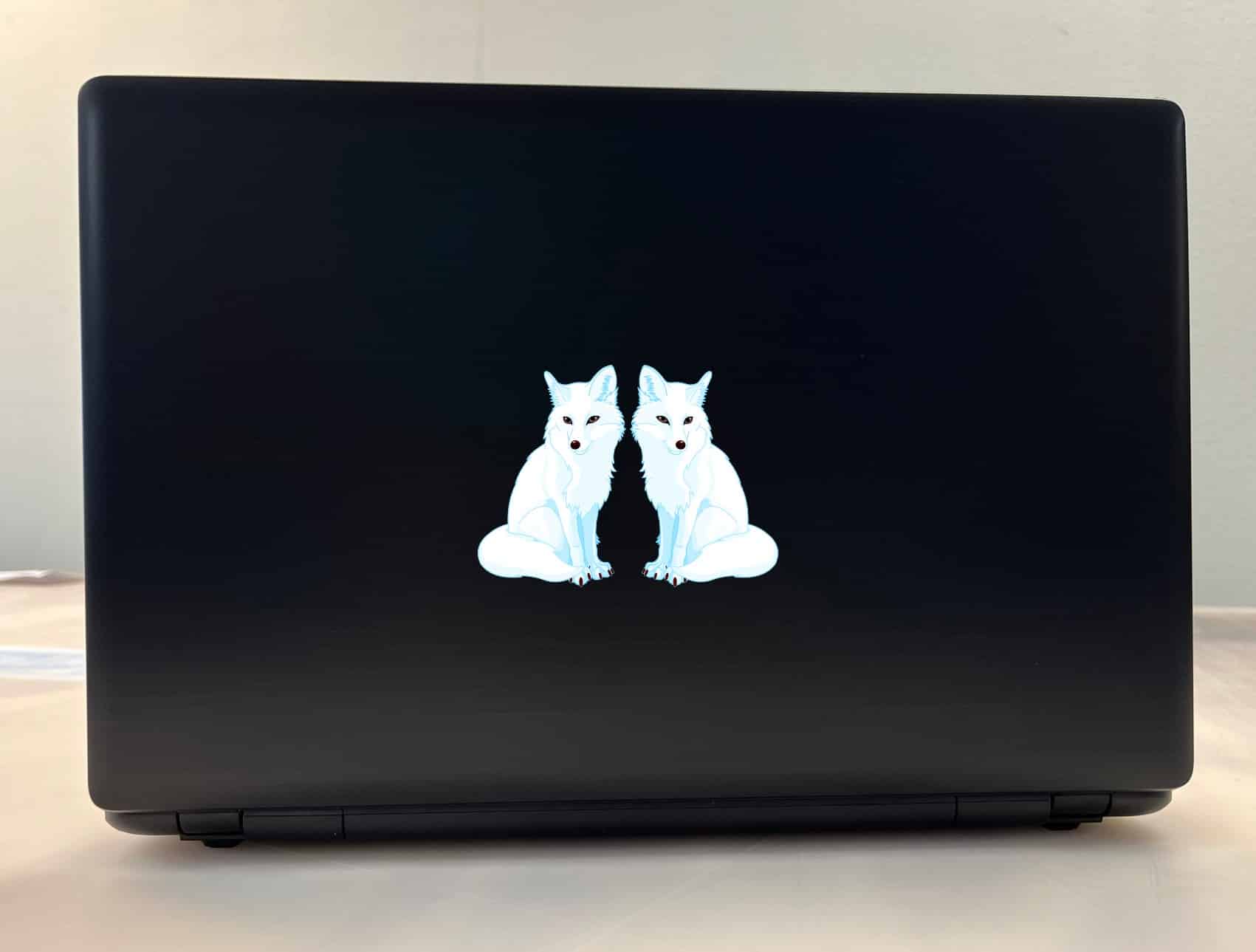 two Arctic wolves, amber eyes, minimalist style - vinyl removable sticker