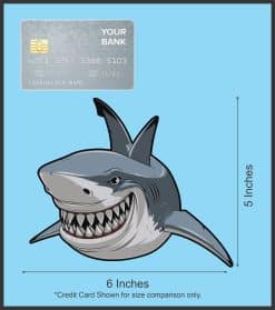 menacing shark face, sharp teeth, cartoon-style artwork - vinyl removable sticker