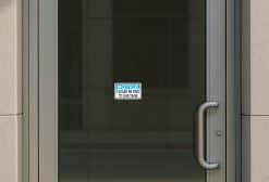 blue header banner, bold white notice text, black body text - vinyl removable sticker