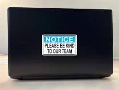 blue header banner, bold white notice text, black body text - vinyl removable sticker