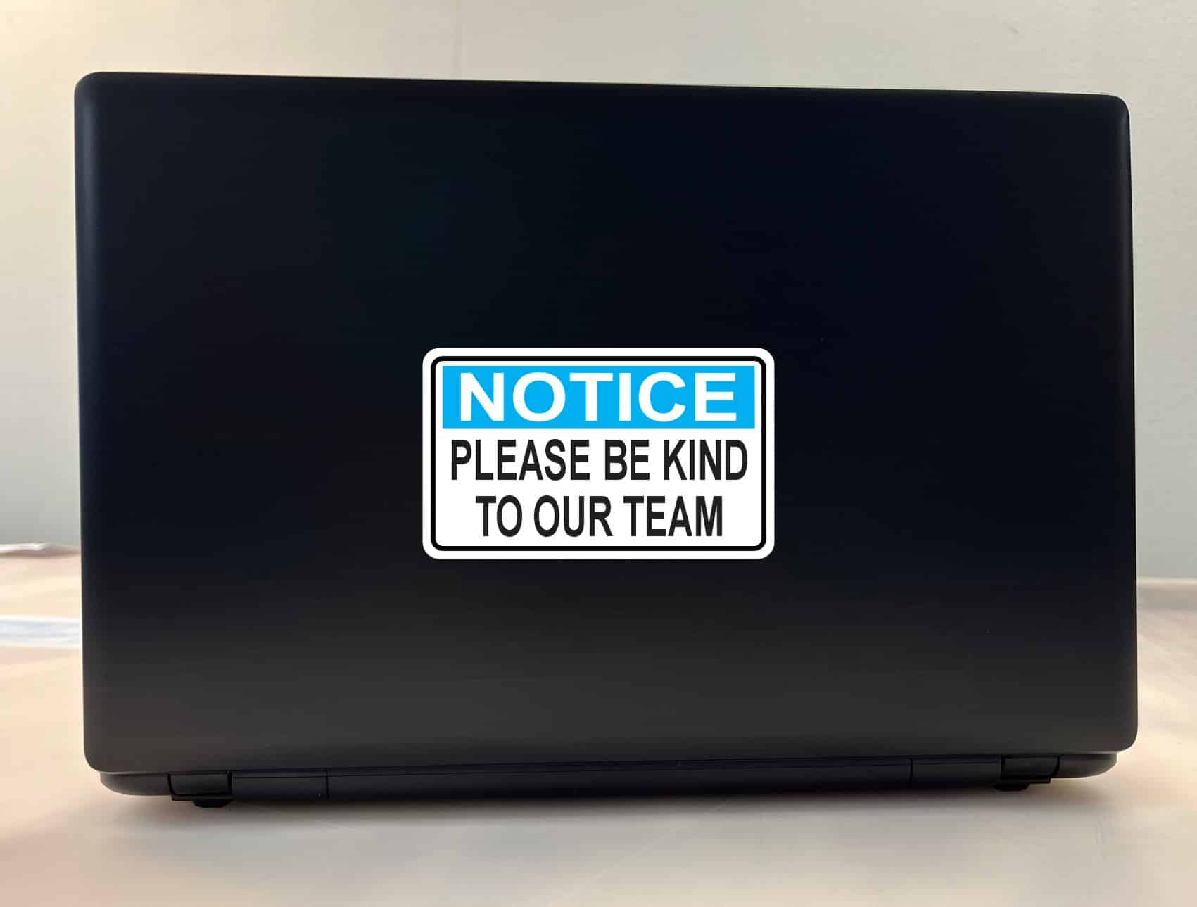 blue header banner, bold white notice text, black body text - vinyl removable sticker