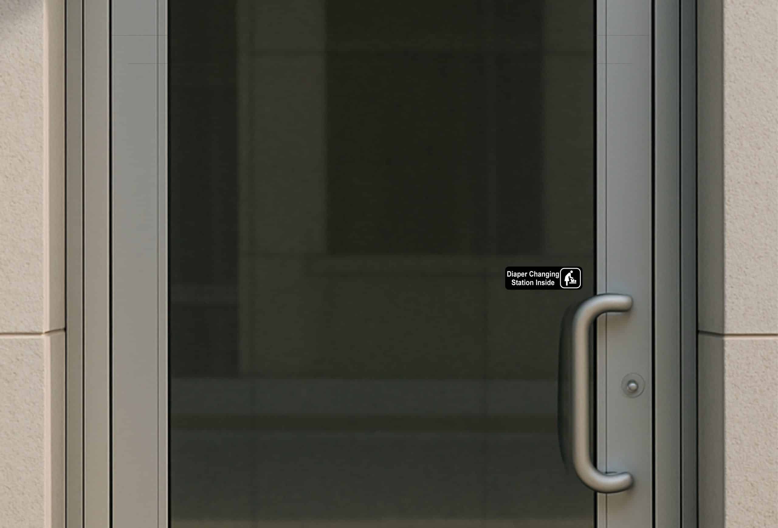 black background, white text, changing station icon - vinyl removable sticker