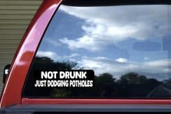 StickerTalk Not Drunk Just Dodging Potholes Vinyl Sticker, 10 inches by 3 inches