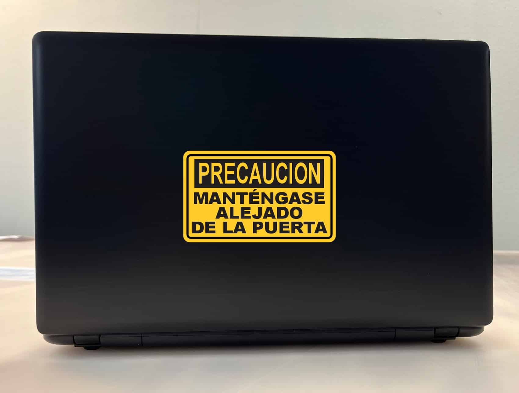 StickerTalk Spanish Caution Stand Clear of Door Vinyl Sticker, 5 inches by 3 inches