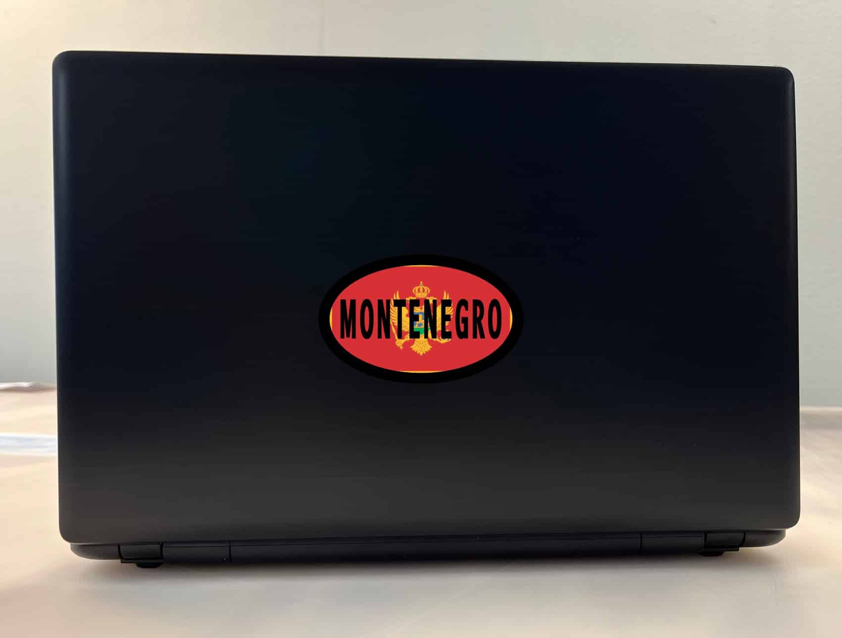 StickerTalk Montenegro Flag Oval Sticker, 4 inches by 2.5 inches